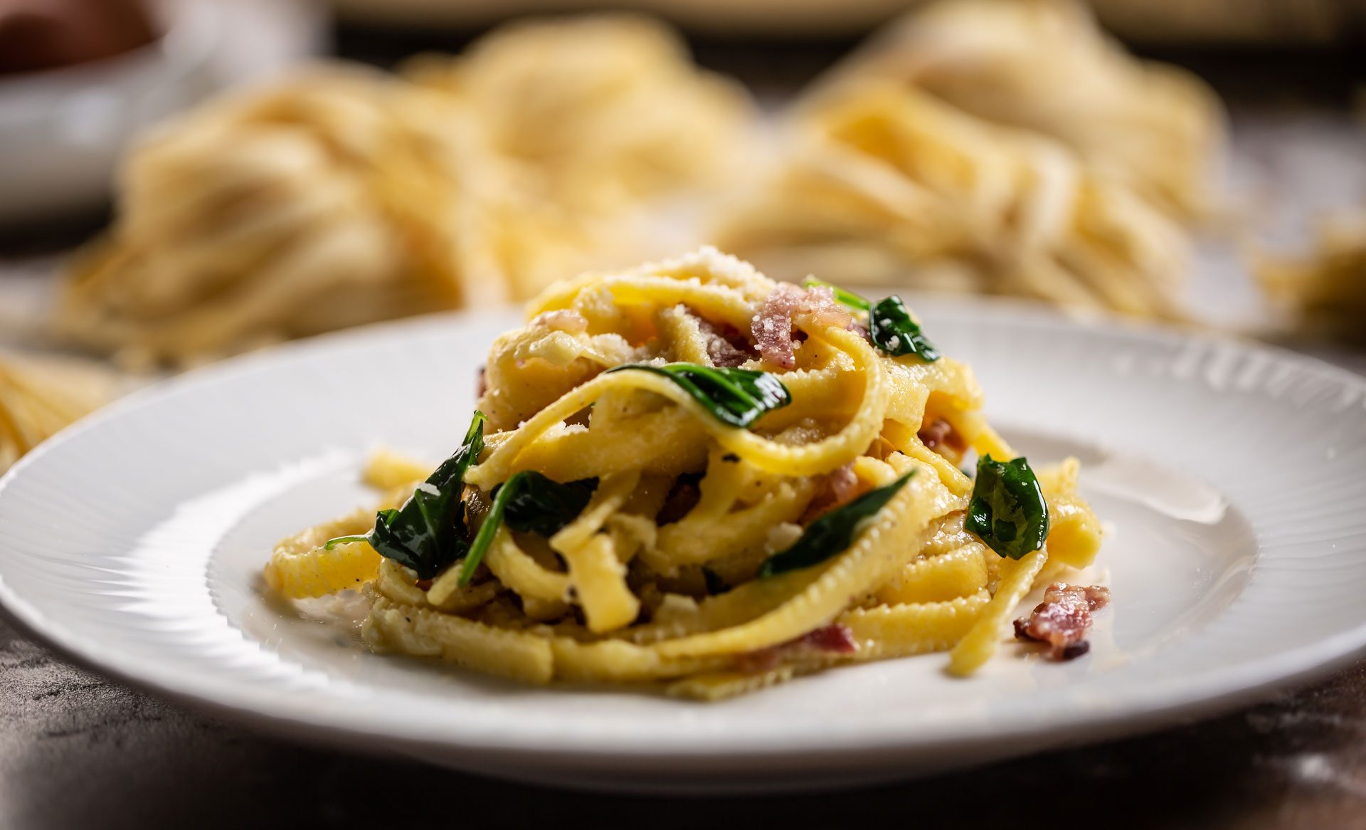 Fettuccine cremose con spinaci e pancetta